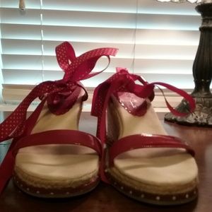 Red heel lace up shoes